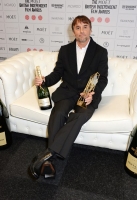 poses at The Moet British Independent Film Awards 2014 at Old Billingsgate Market on December 7, 2014 in London, England.