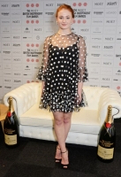 poses at The Moet British Independent Film Awards 2014 at Old Billingsgate Market on December 7, 2014 in London, England.