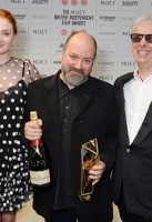 poses at The Moet British Independent Film Awards 2014 at Old Billingsgate Market on December 7, 2014 in London, England.